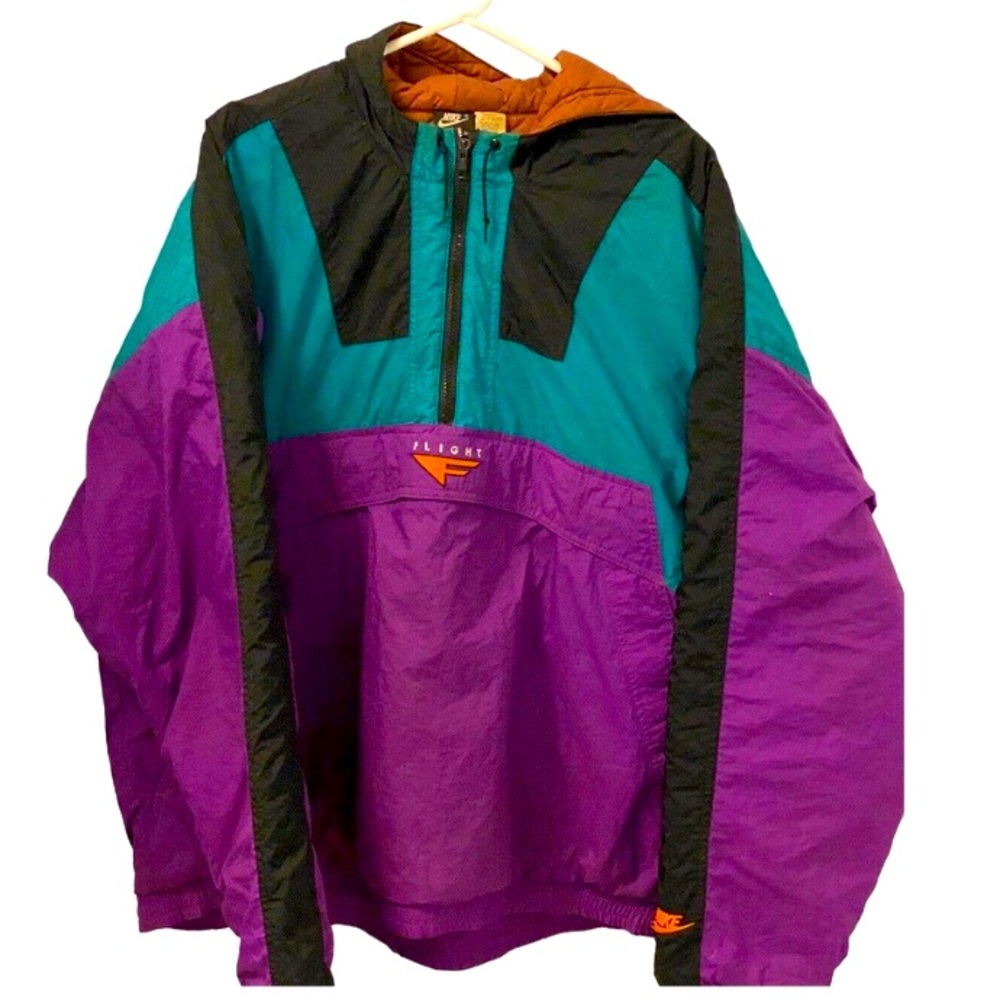Vintage 1990s Nike Flight for Foot Locker puffy windbreaker jacket.